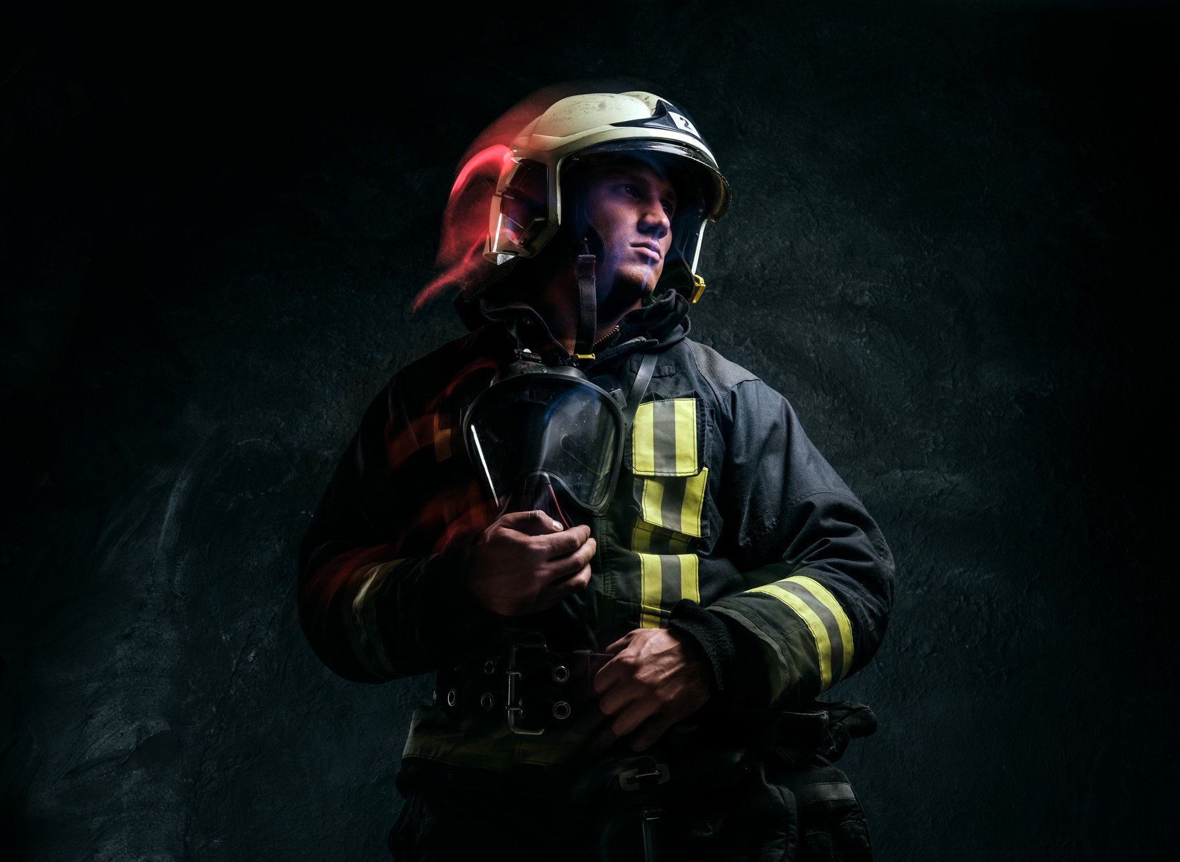 Firefighter in Uniform and Safety Helmet 